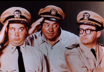 L-R: Tim Conway as Ensign Parker, Ernest Borgnine as McHale, and Joe Flynn as Capt. Binghamton